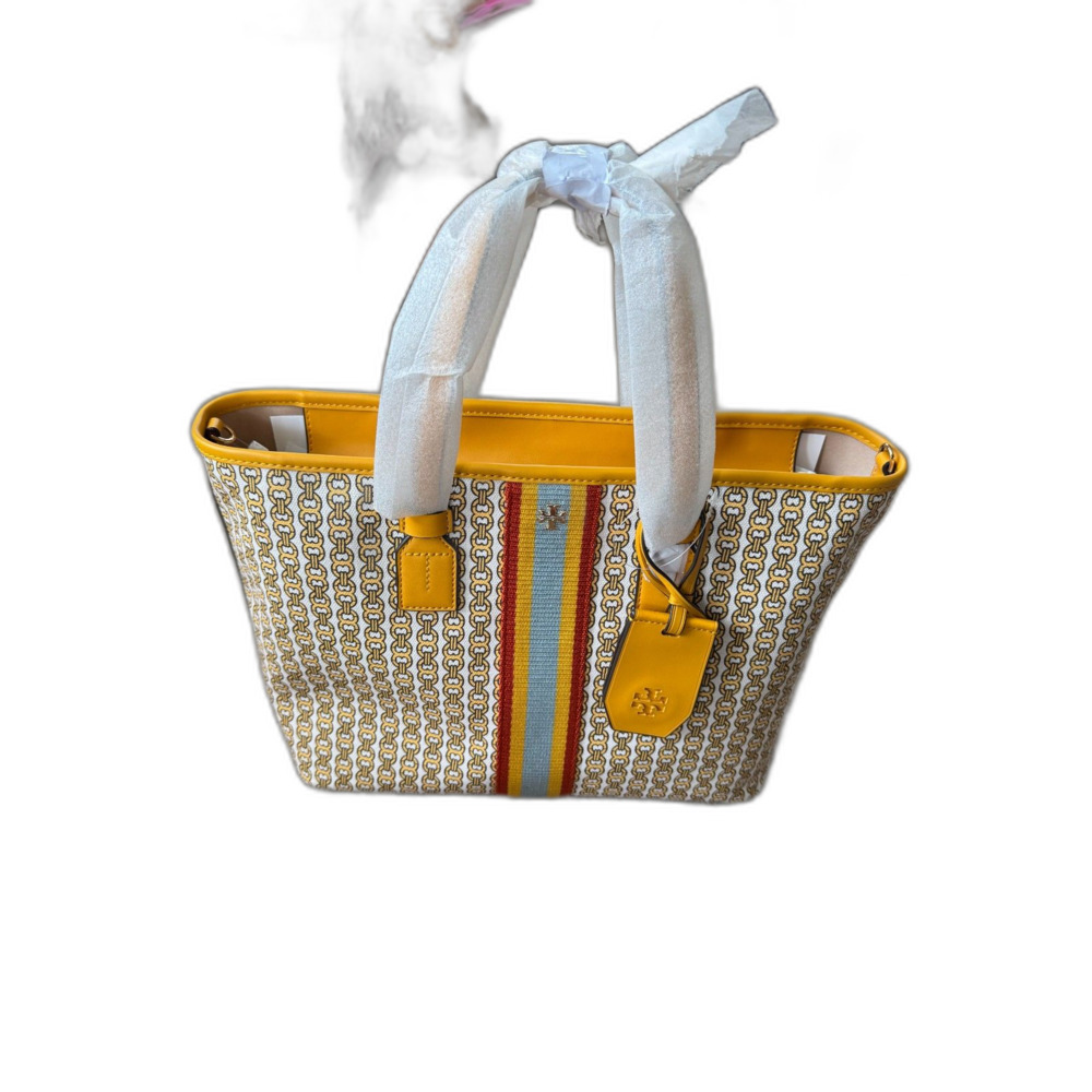 Tory Burch Gemini Link collection in the vibrant Daylily (yellow) colorway NWT